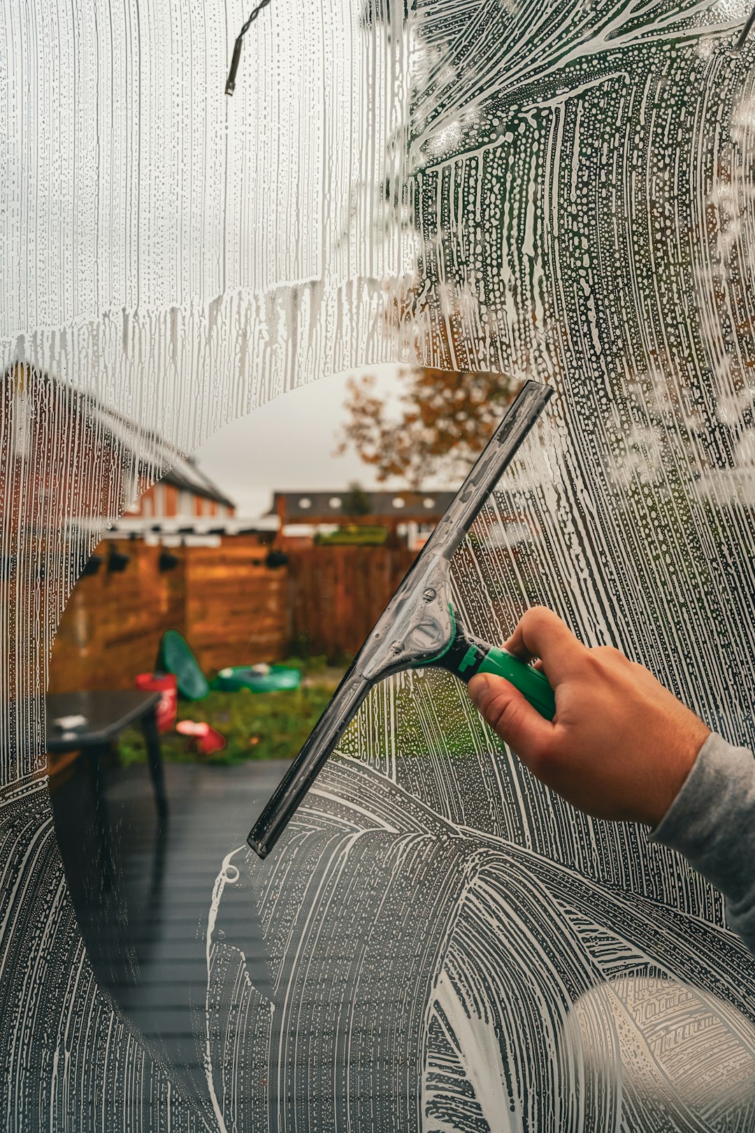 creative-01 a-person-is-drawing-a-picture-on-a-window-jr9wxkcwjt0